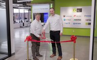 CEOs Robert Franz and Mark Radford opening the TKH Vision Cupertino Office